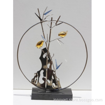 mixed metal sculpture in modern style